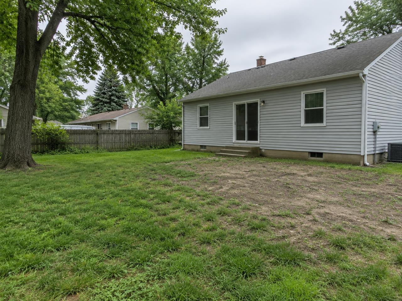 Bare backyard before outdoor improvements